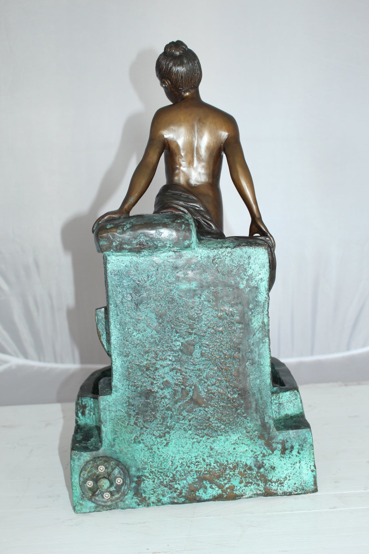 Lady on Wall fountain Bronze Statue - Size: 12"L x 9"W x 21"H.