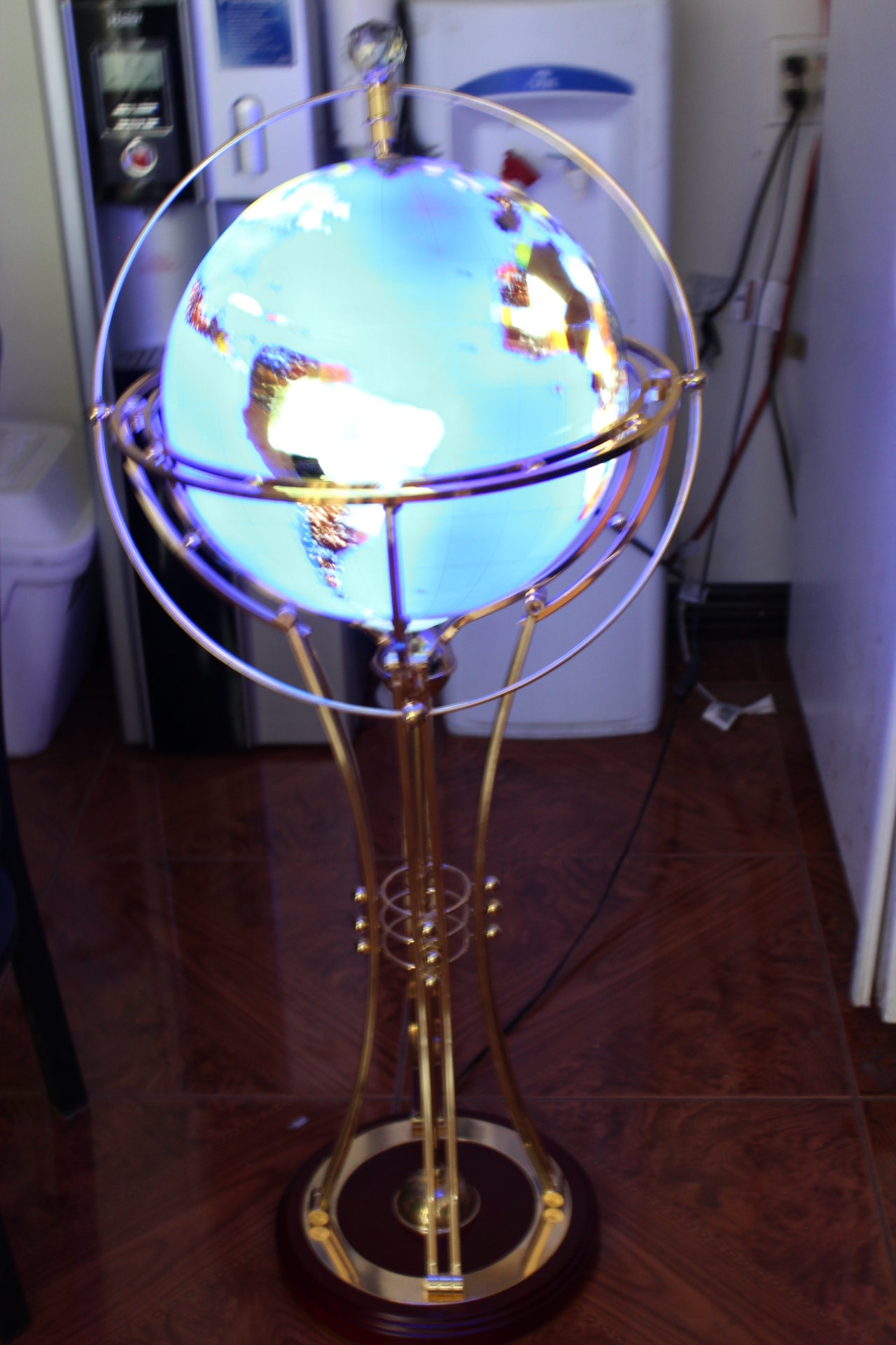 Illuminated Blue Ocean World Globe Rotating by motor - 18"L x 18"W x 42"H.