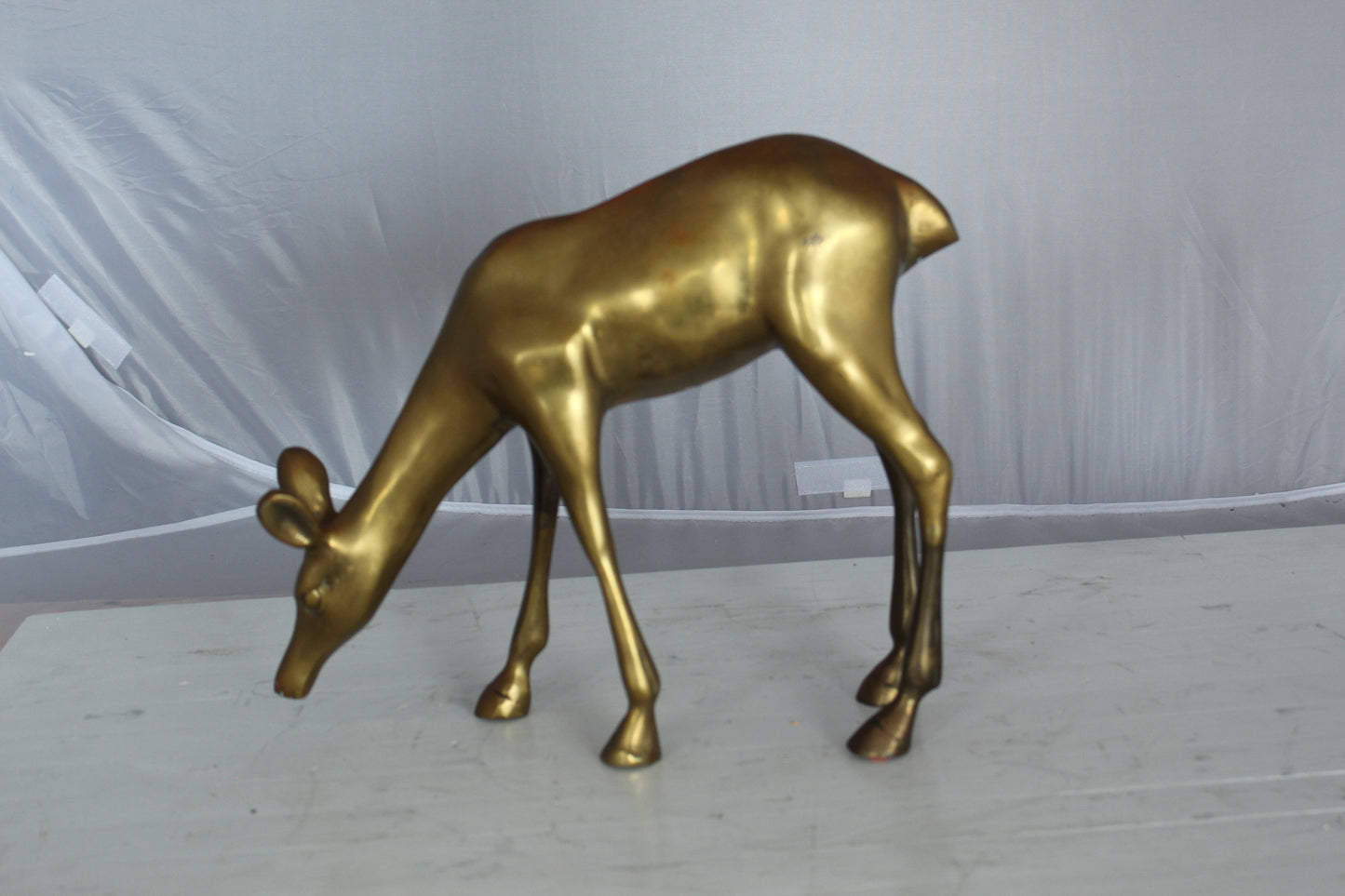 Two Tone color deer bronze statue - Size: 13"L x 4"W x 11"H.