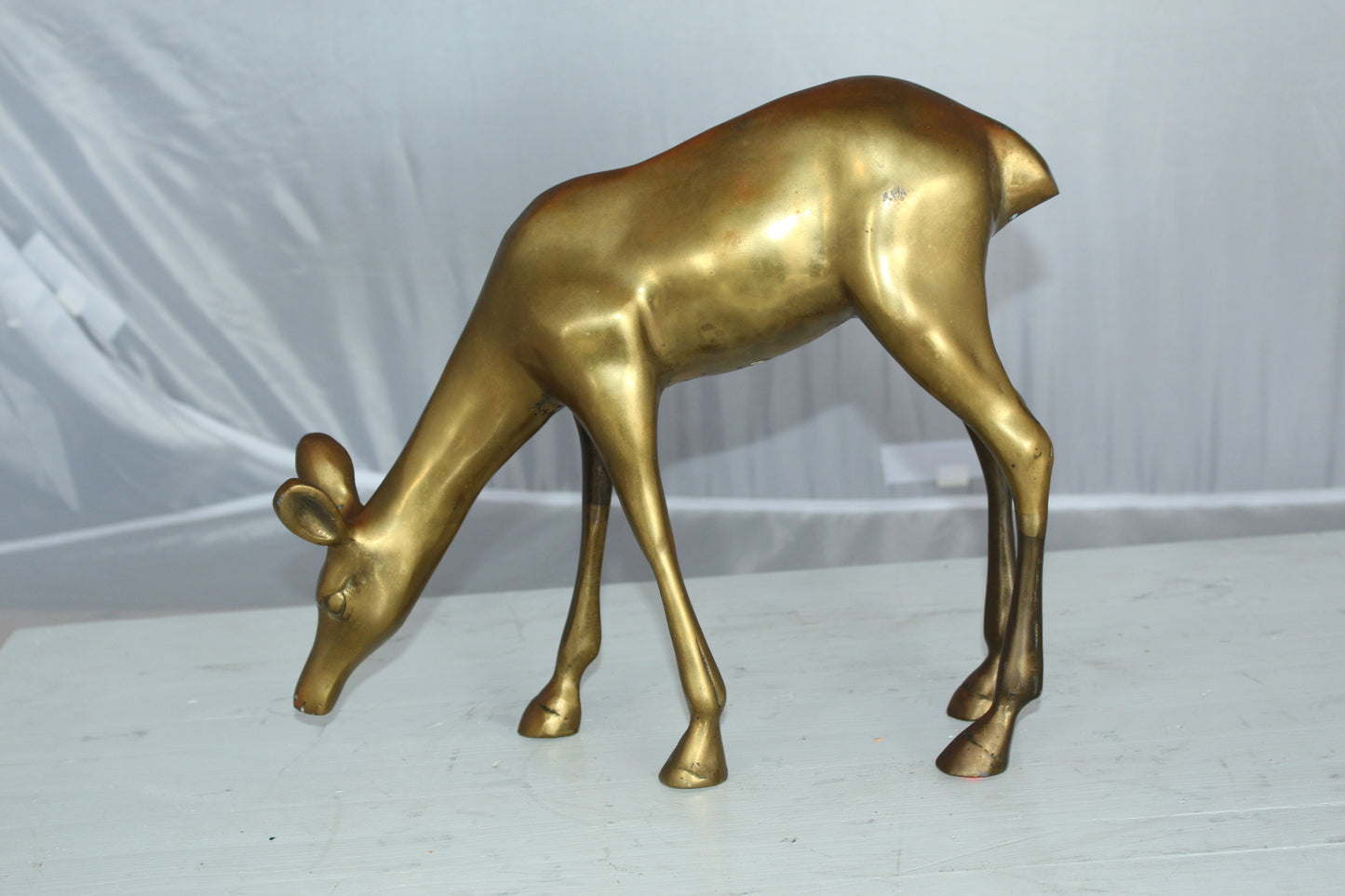 Two Tone color deer bronze statue - Size: 13"L x 4"W x 11"H.