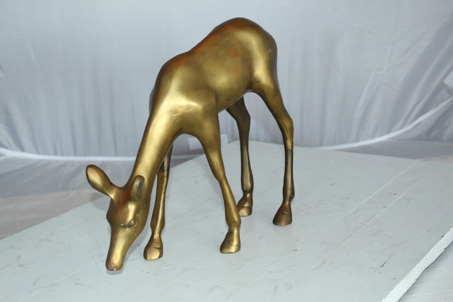 Two Tone color deer bronze statue - Size: 13"L x 4"W x 11"H.