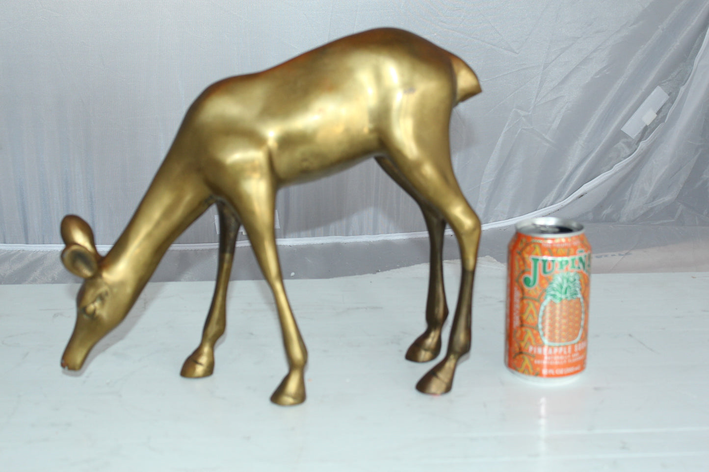 Two Tone color deer bronze statue - Size: 13"L x 4"W x 11"H.