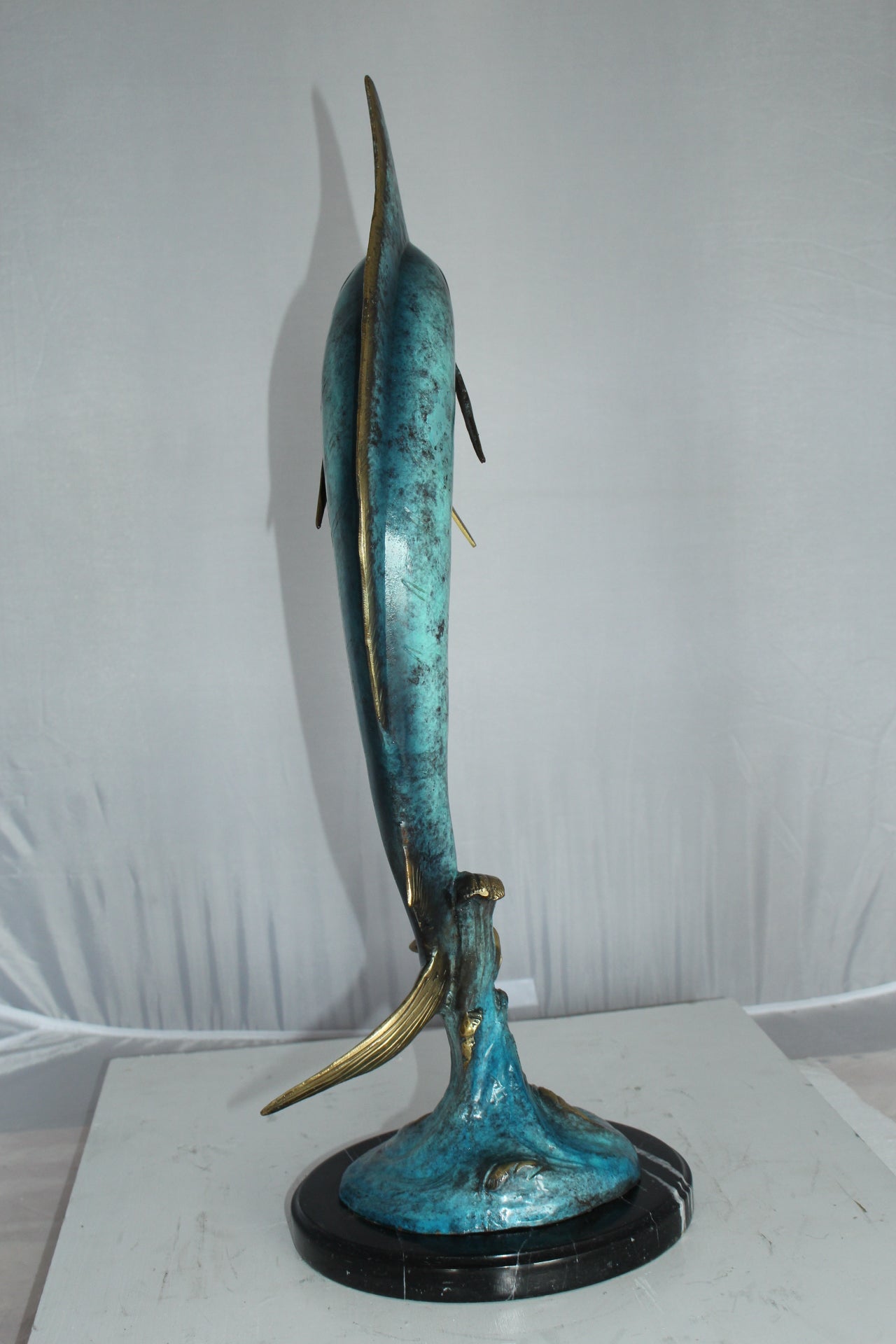 Single Marlin Fish bronze statue - Size: 9"L x 9"W x 27"H.