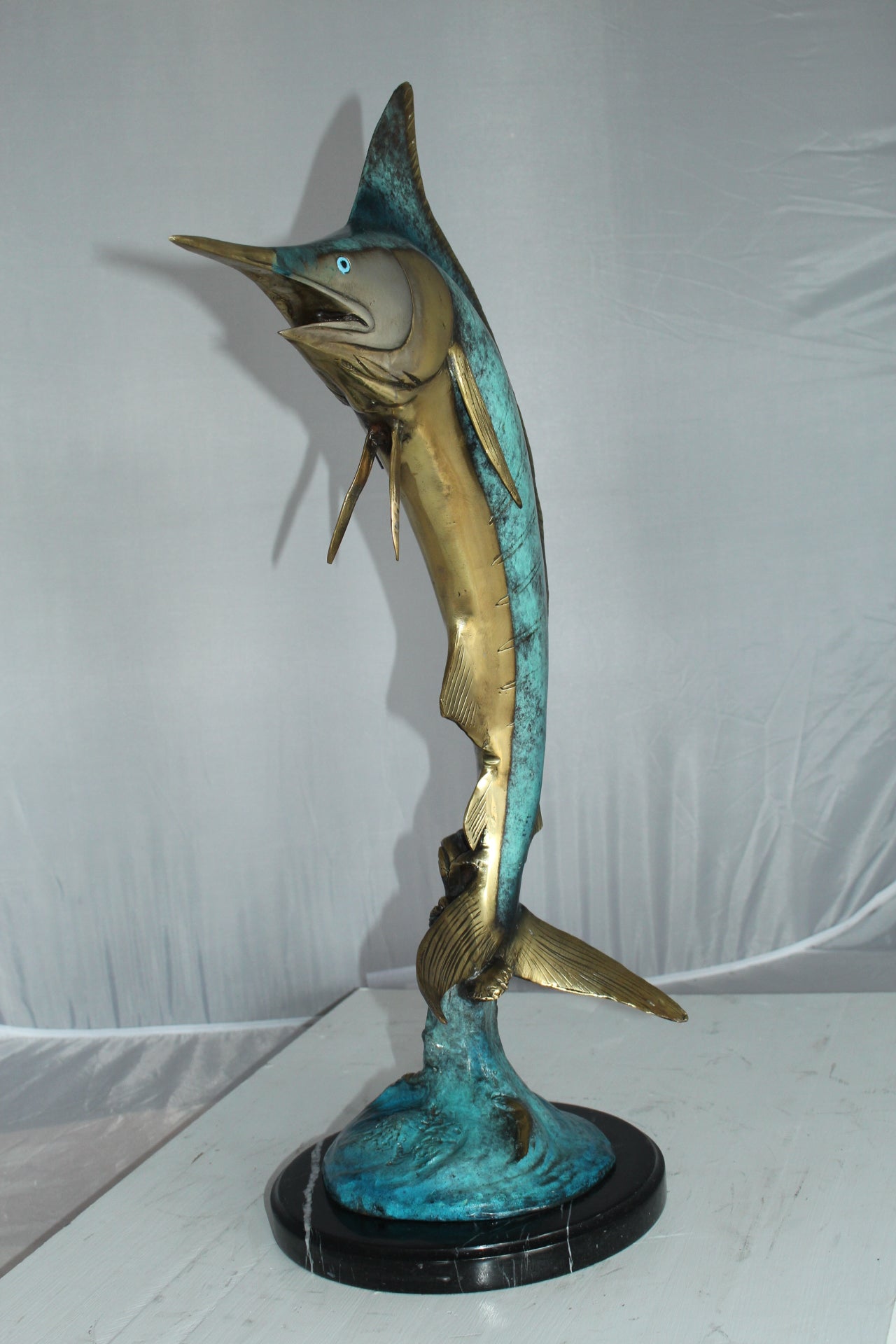 Single Marlin Fish bronze statue - Size: 9"L x 9"W x 27"H.