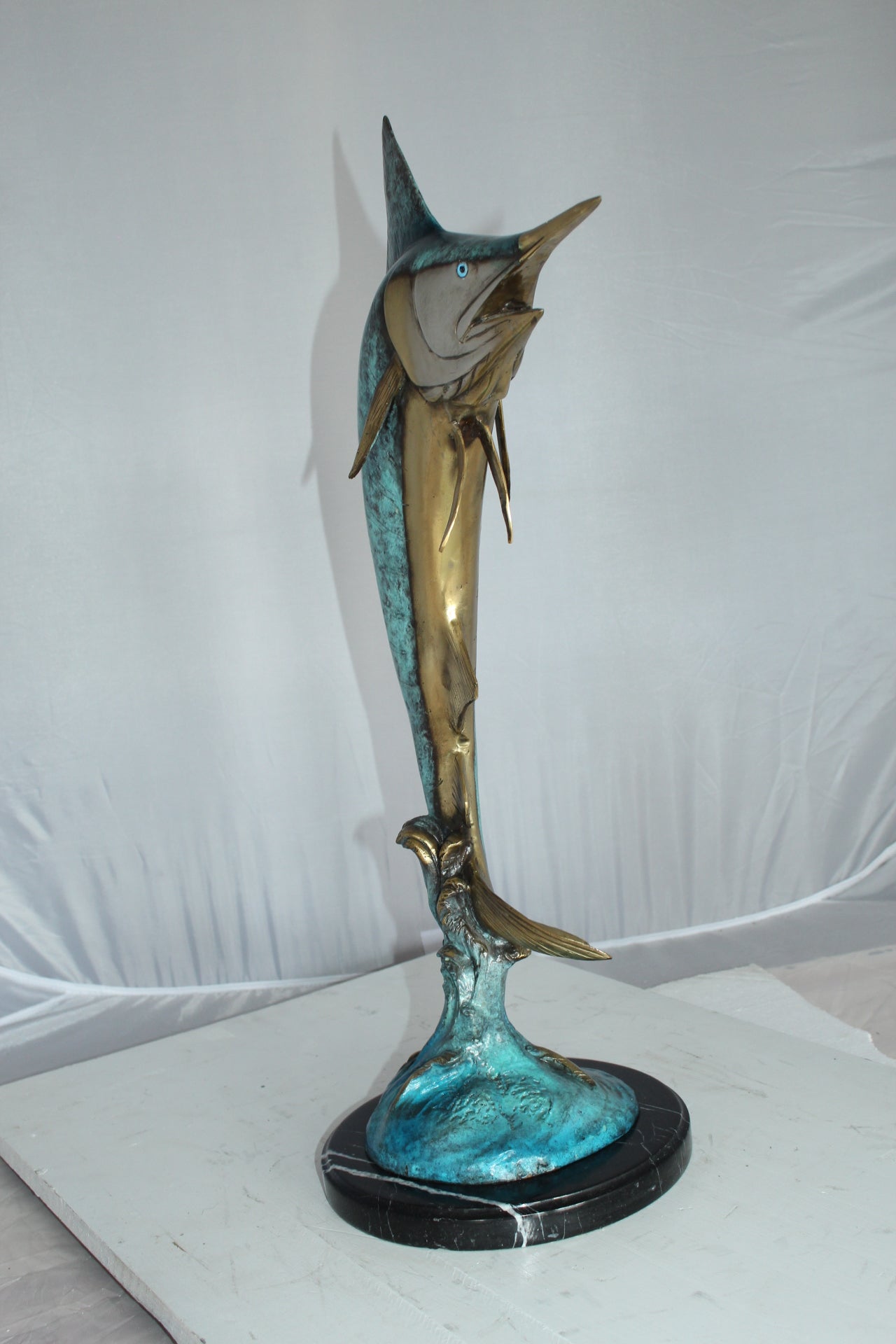 Single Marlin Fish bronze statue - Size: 9"L x 9"W x 27"H.