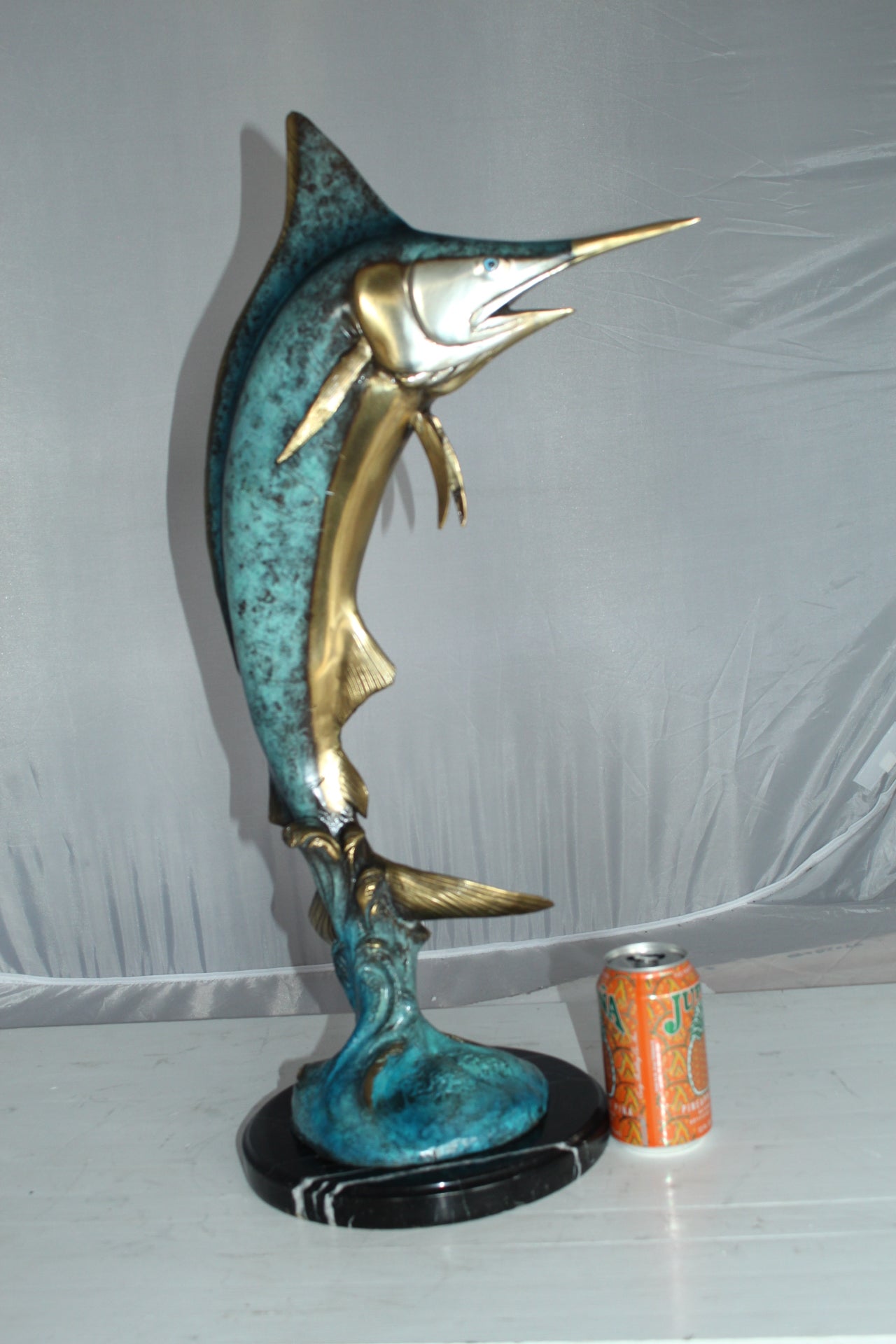 Single Marlin Fish bronze statue - Size: 9"L x 9"W x 27"H.