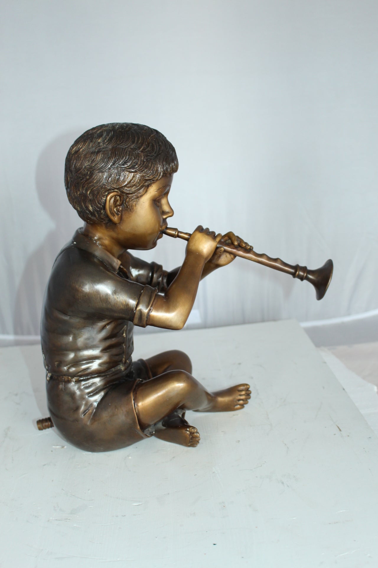 Boy with Flute fountain bronze statue - Size: 7"L x 11"W x 14"H.