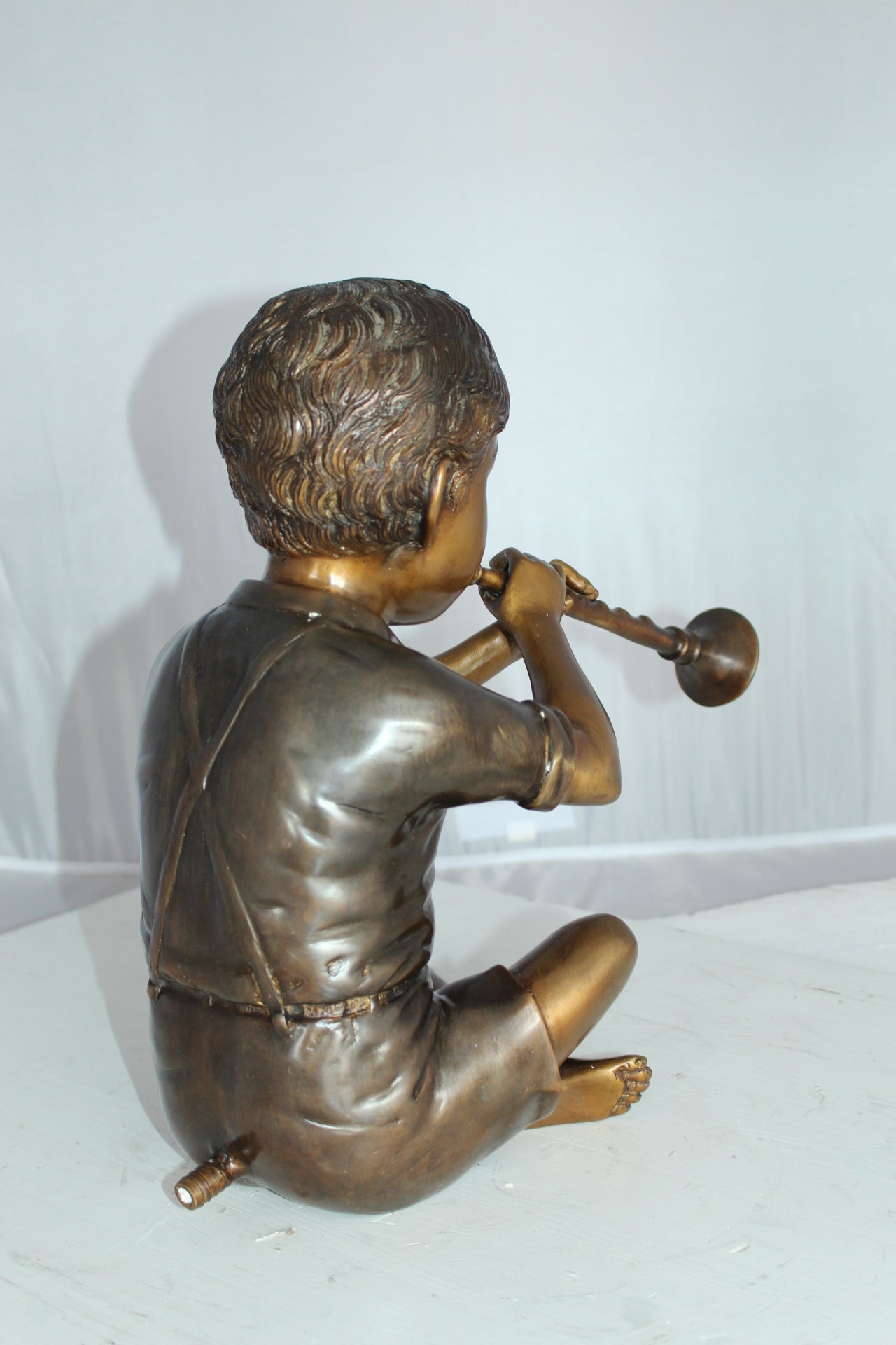 Boy with Flute fountain bronze statue - Size: 7"L x 11"W x 14"H.