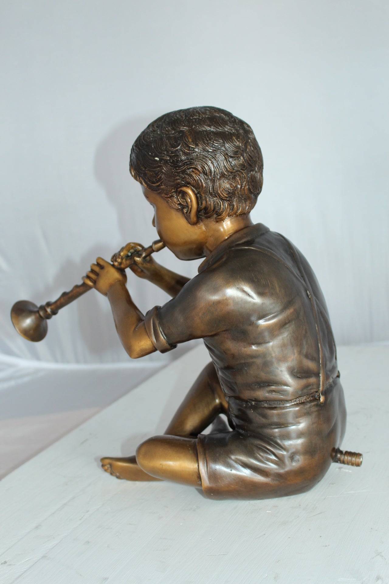 Boy with Flute fountain bronze statue - Size: 7"L x 11"W x 14"H.