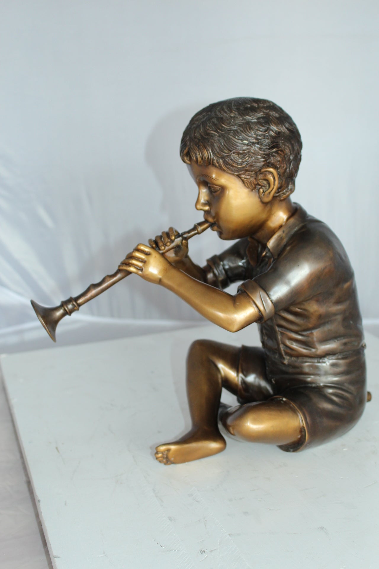 Boy with Flute fountain bronze statue - Size: 7"L x 11"W x 14"H.