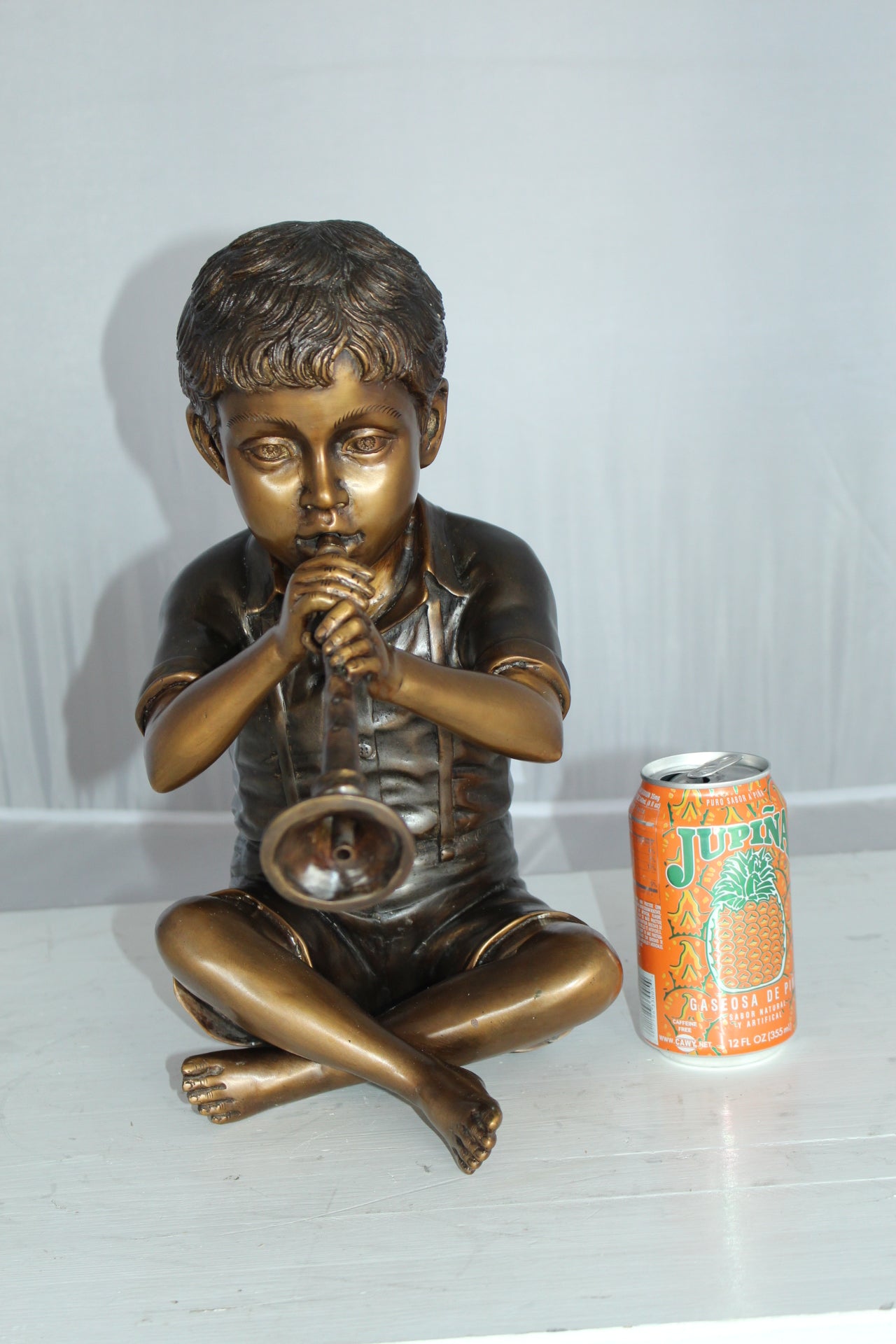 Boy with Flute fountain bronze statue - Size: 7"L x 11"W x 14"H.