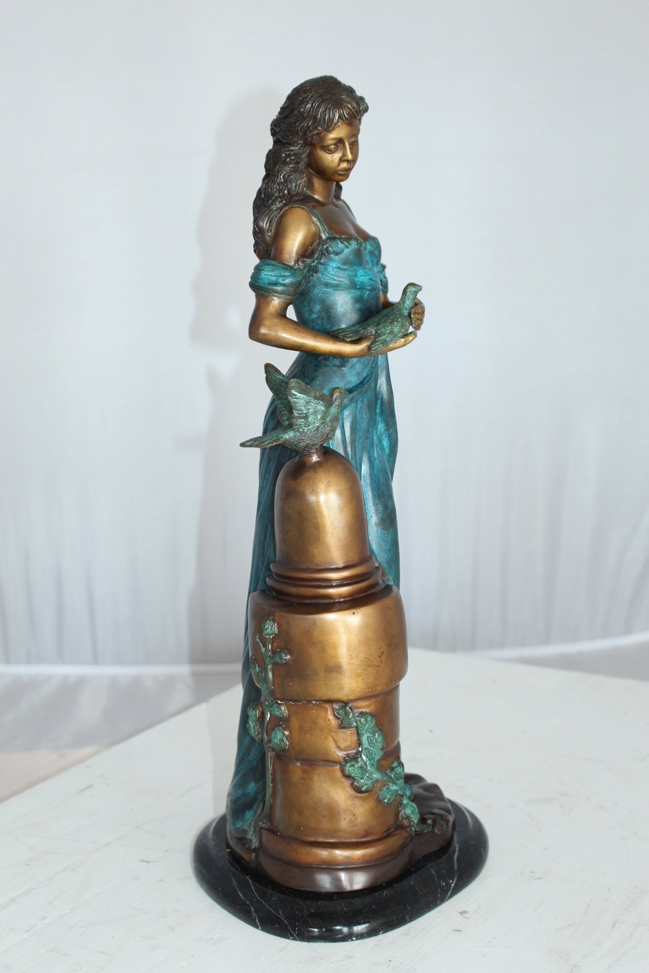 Girl with a Bird Bronze Statue - Size: 7"L x 7"W x 18"H.