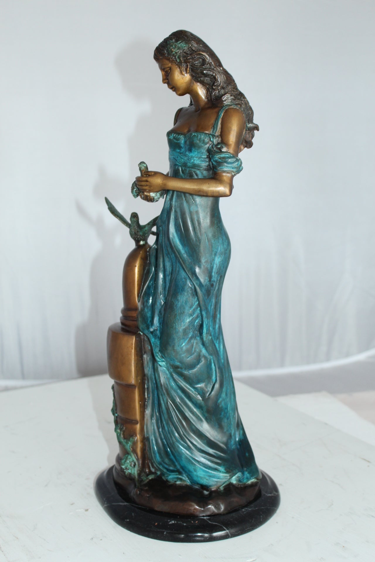 Girl with a Bird Bronze Statue - Size: 7"L x 7"W x 18"H.