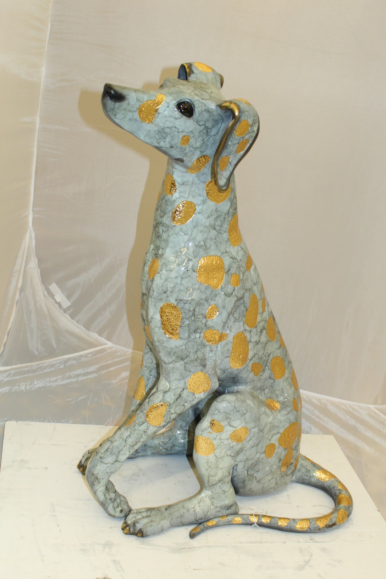 Pair of Golden Pleated Dalmatians Sitting Bronze Statue - 21"L x 16"W x 35"H.