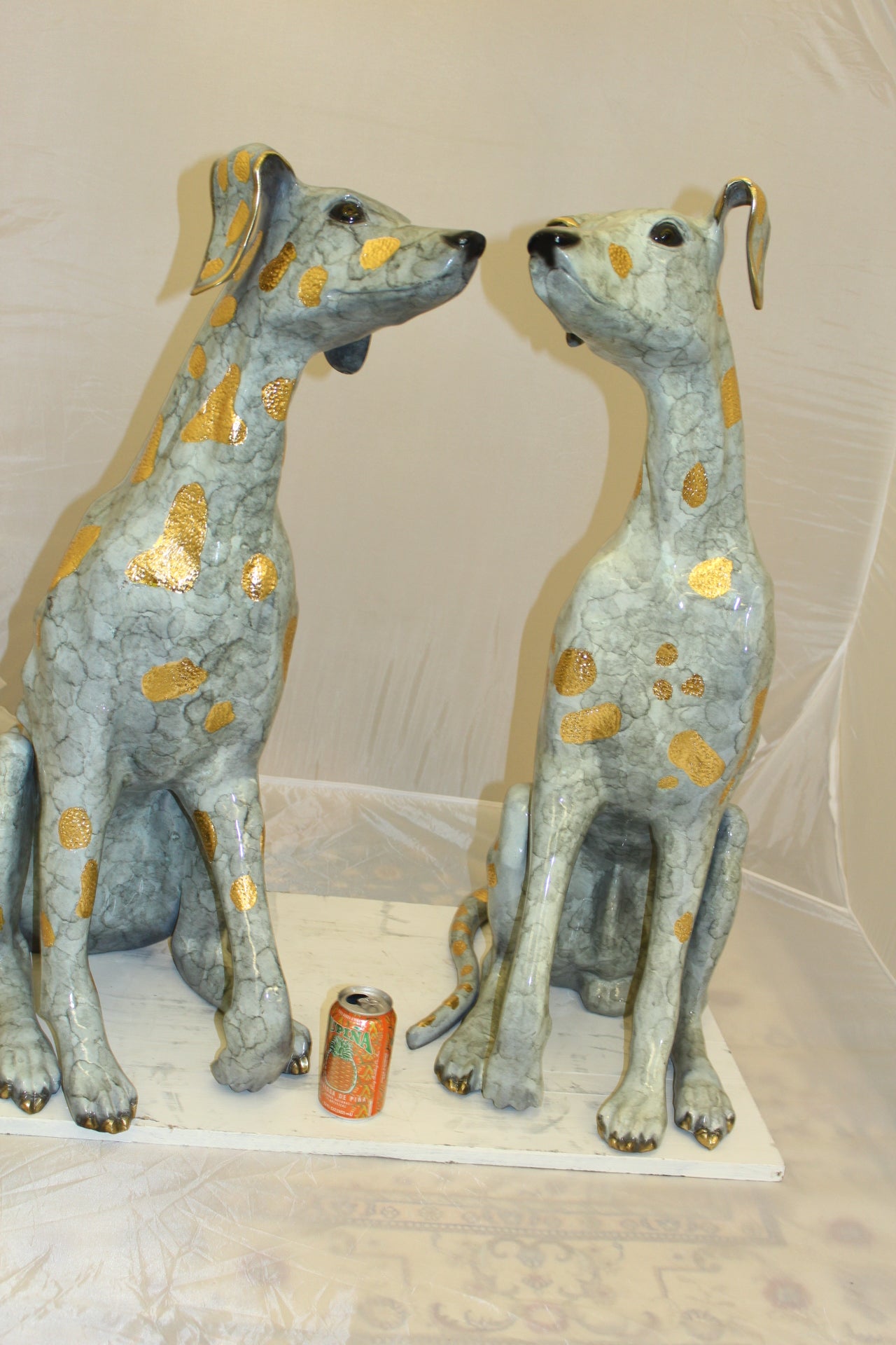 Pair of Golden Pleated Dalmatians Sitting Bronze Statue - 21"L x 16"W x 35"H.