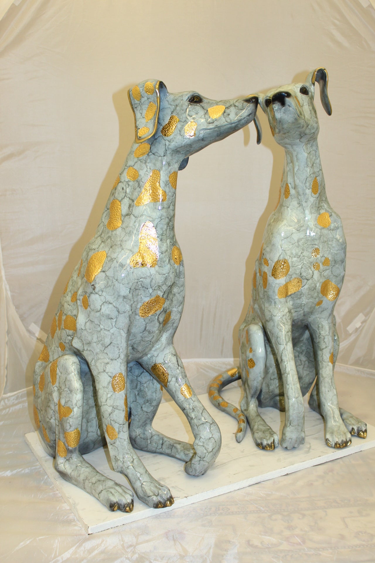 Pair of Golden Pleated Dalmatians Sitting Bronze Statue - 21"L x 16"W x 35"H.