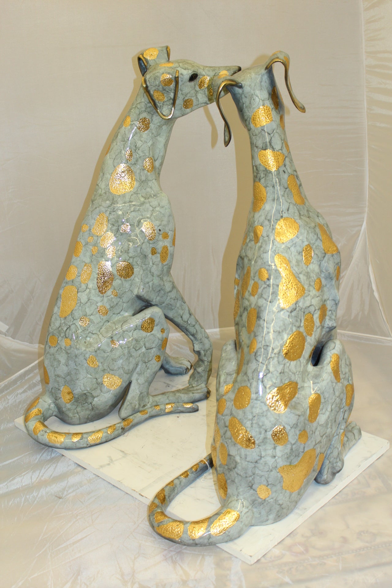 Pair of Golden Pleated Dalmatians Sitting Bronze Statue - 21"L x 16"W x 35"H.