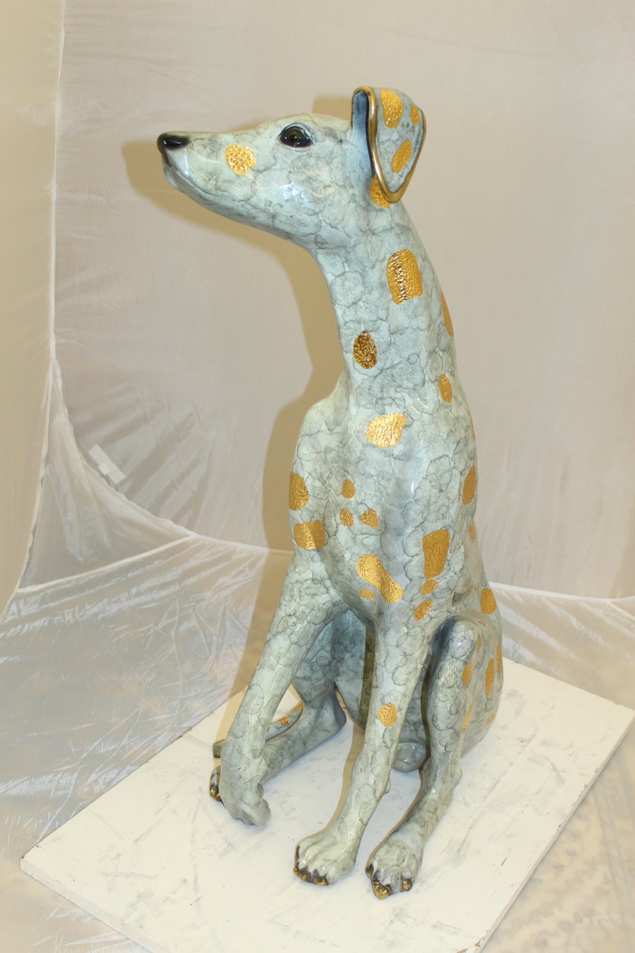 Pair of Golden Pleated Dalmatians Sitting Bronze Statue - 21"L x 16"W x 35"H.