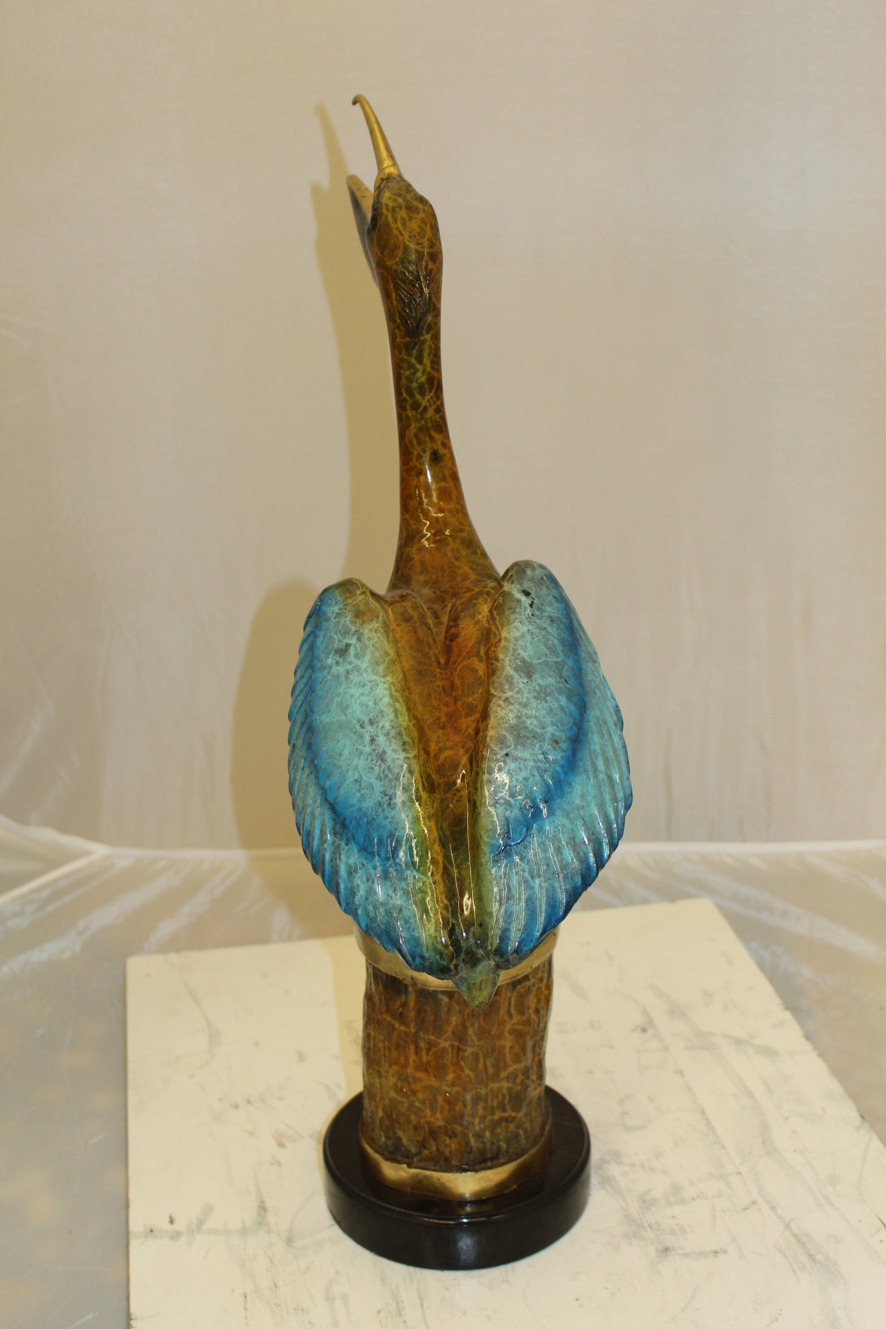 Pelican on a Tree Stump Bronze Statue -  Size: 8"L x 12"W x 27"H.