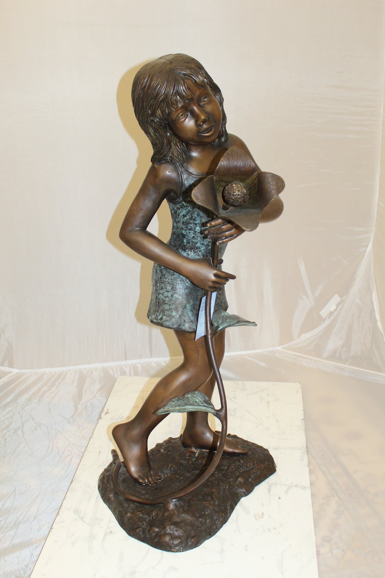 Girl Holding a Flower Fountain Bronze Statue - Size: 15"L x 15"W x 35"H.