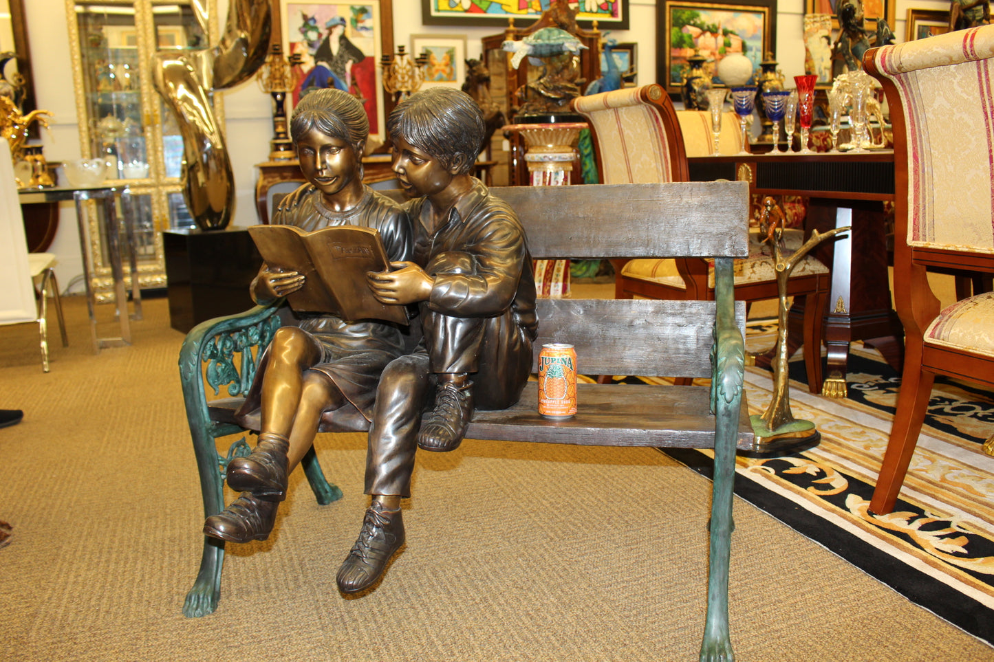 Kids Reading a Book on a Bench Bronze Statue - Size: 23"L x 38"W x 37"H.