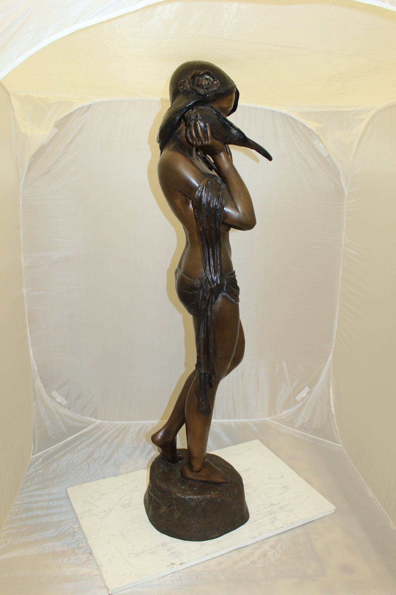 Girl Holding a Sea Shell Bronze Statue - Size: 13"L x 14"W x 57"H.