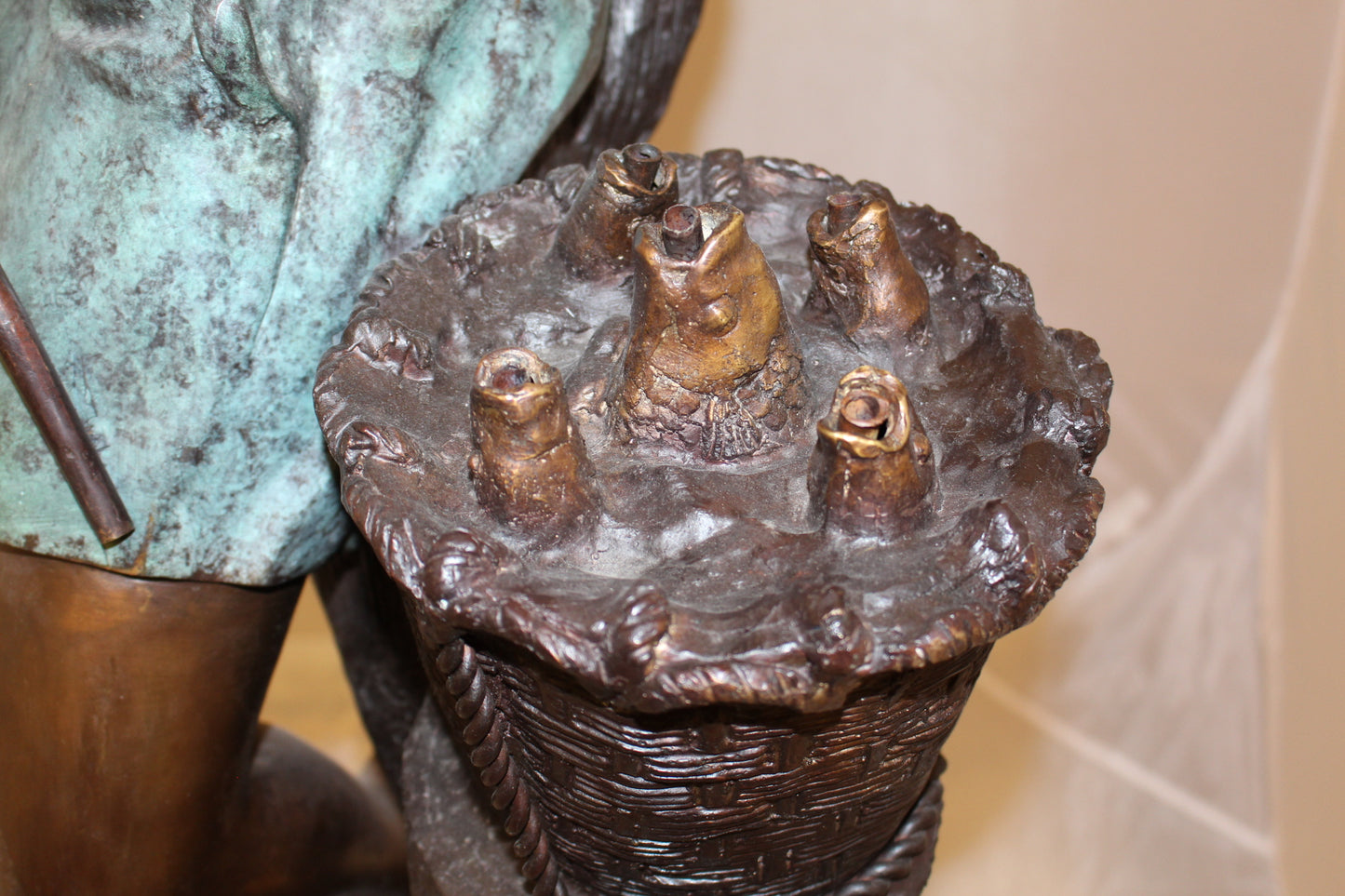 Boy Sitting on a Tree and Fishing Bronze Statue - Size: 36"L x 21"W x 37"H.