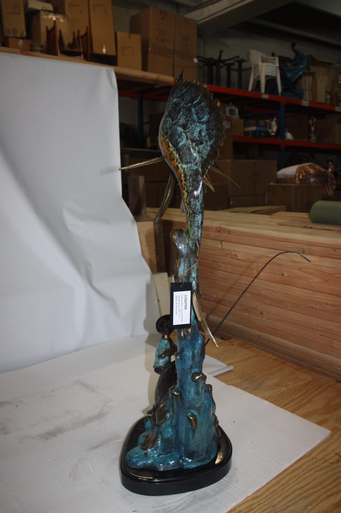 Old man on boat Or fishing man -  Size: 16"L x 12"W x 40"H.