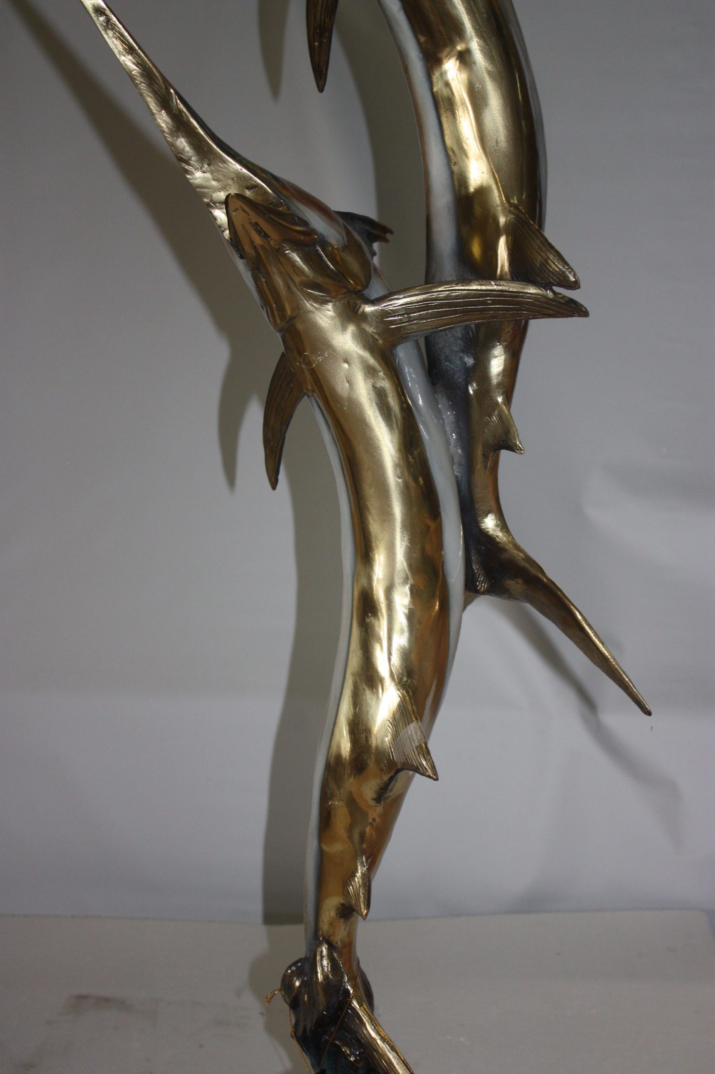 Two Sail fish Bronze Statue on a marble base - Size: 17"L x 17"W x 56"H.