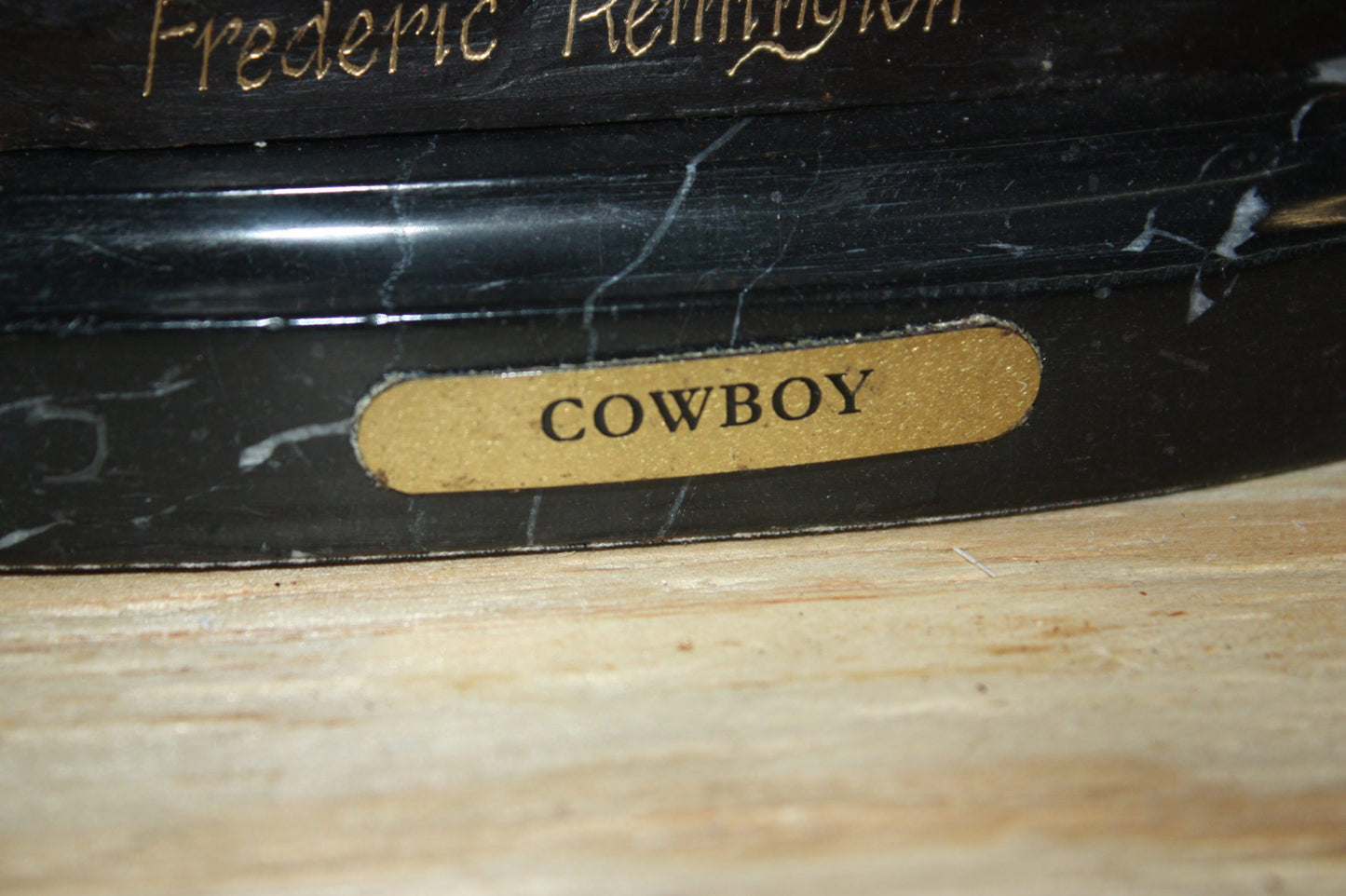 Remington Cowboy on marble Bronze Statue - Size: 10"L x 3.5"W x 10"H.