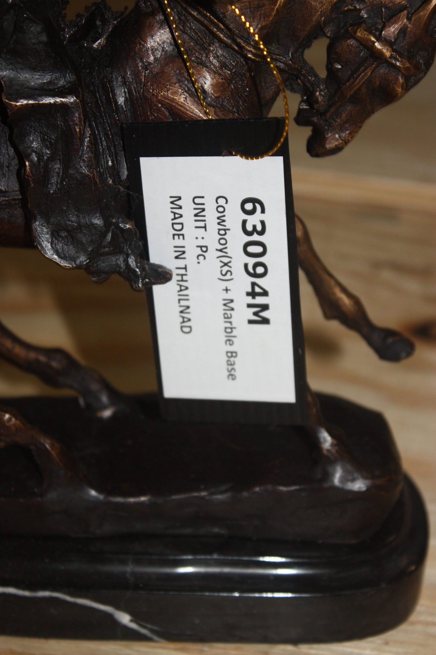 Remington Cowboy on marble Bronze Statue - Size: 10"L x 3.5"W x 10"H.