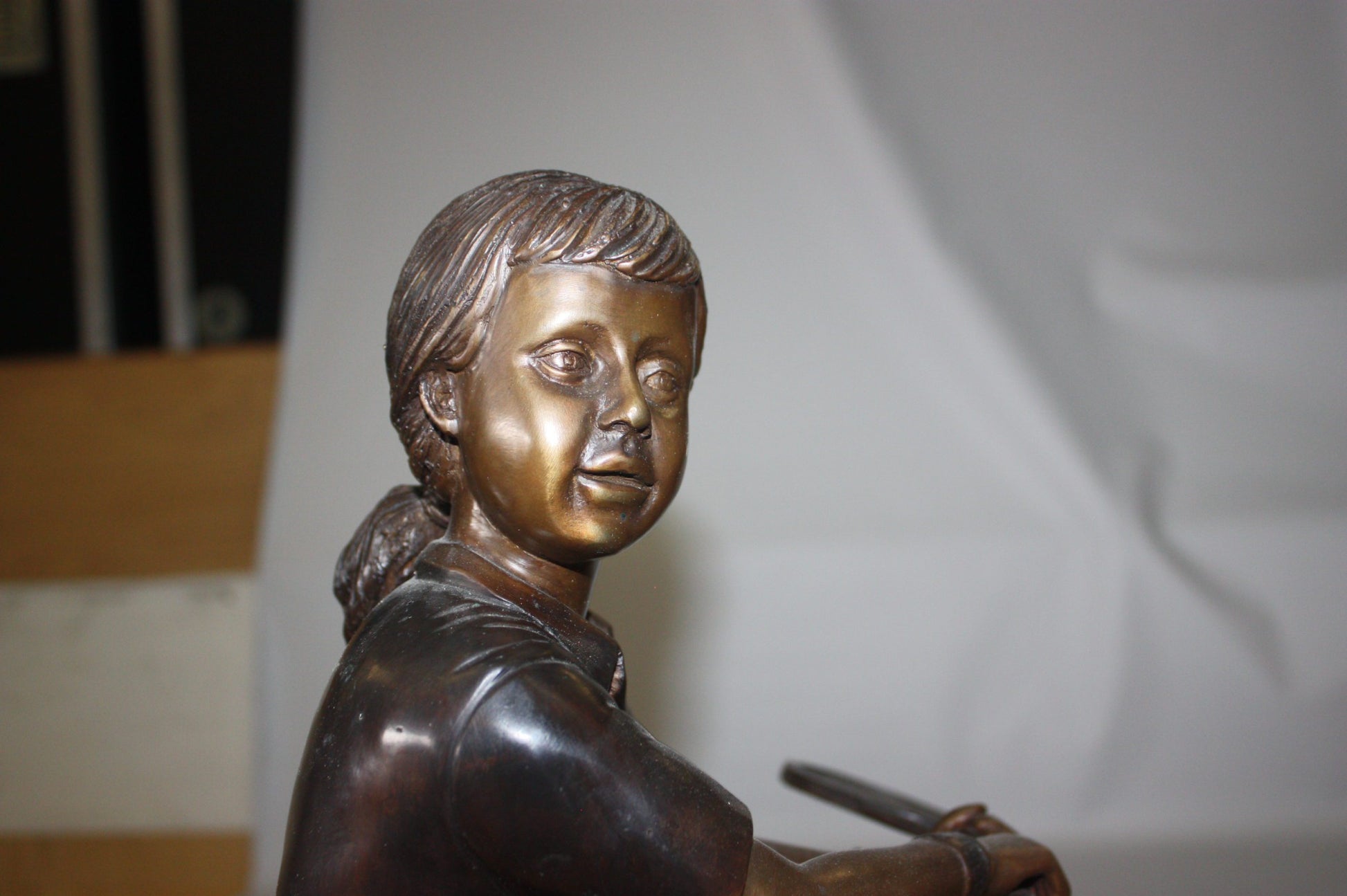 Girl Playing Tennis - Bronze Statue -  Size: 10"L x 11"W x 21"H.