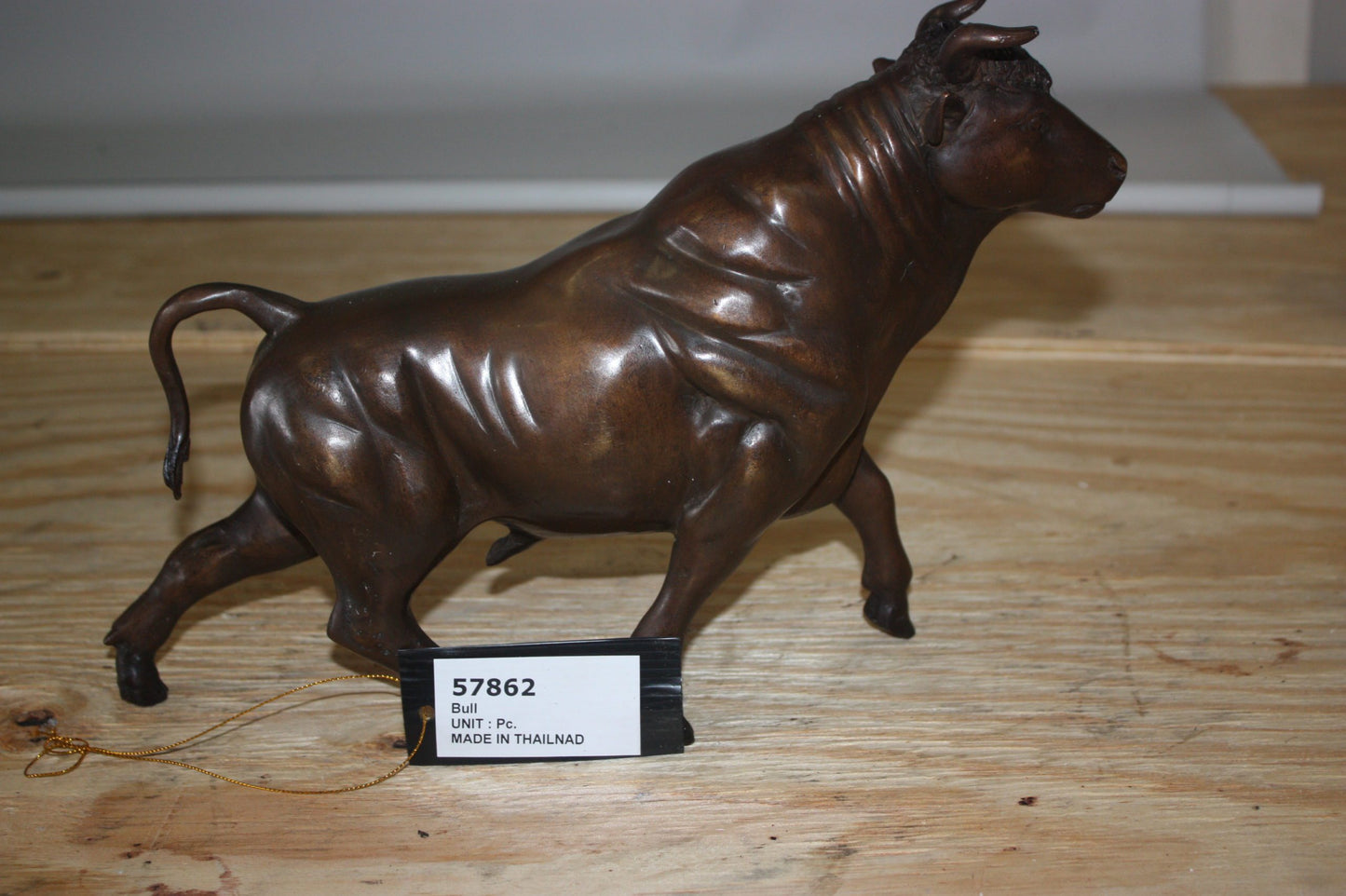 Bull Head up - Bronze Statue - Size: 15"L x 4"W x 10"H.