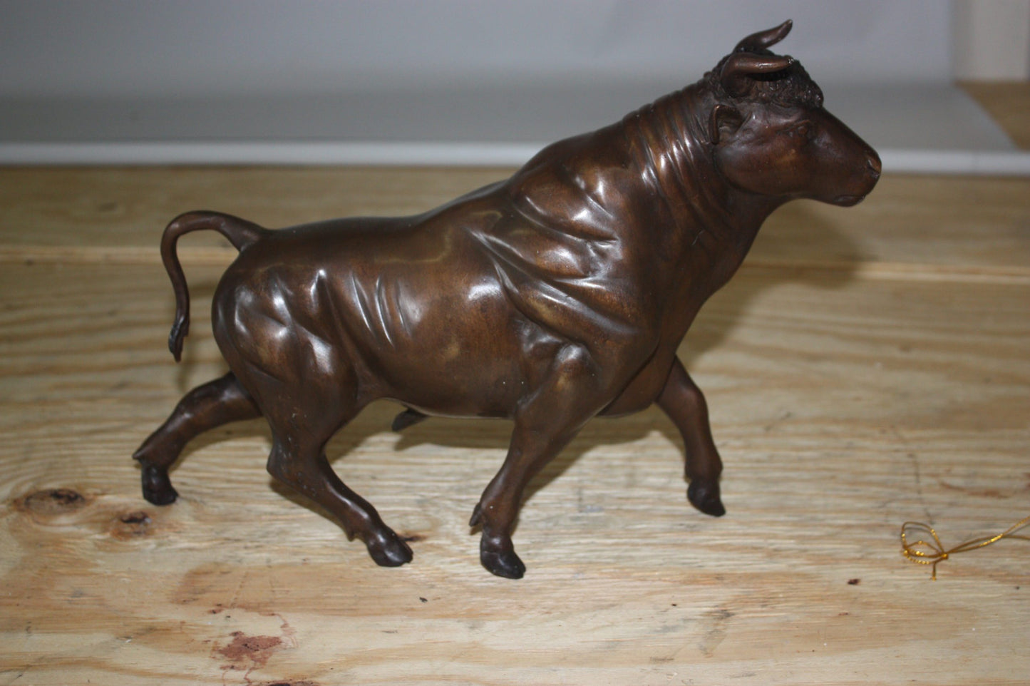 Bull Head up - Bronze Statue - Size: 15"L x 4"W x 10"H.