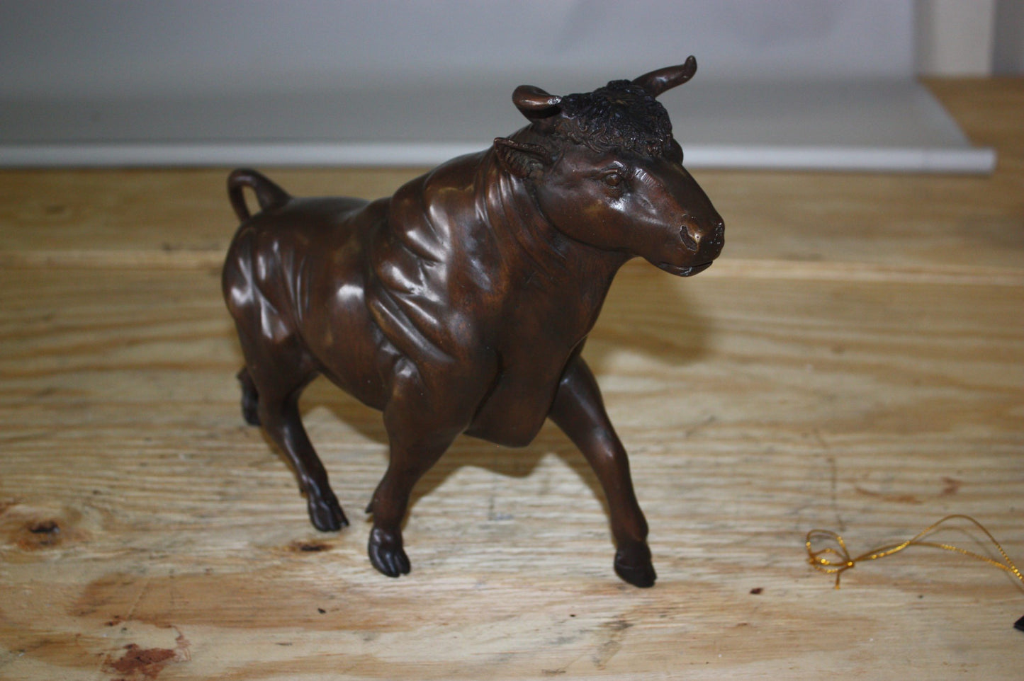Bull Head up - Bronze Statue - Size: 15"L x 4"W x 10"H.