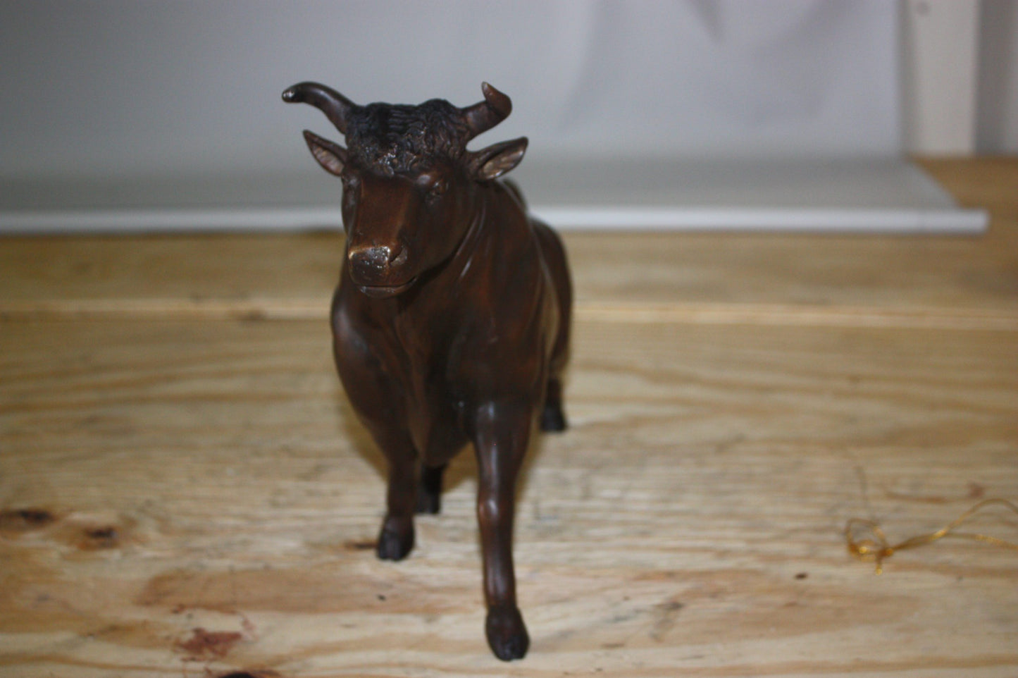 Bull Head up - Bronze Statue - Size: 15"L x 4"W x 10"H.