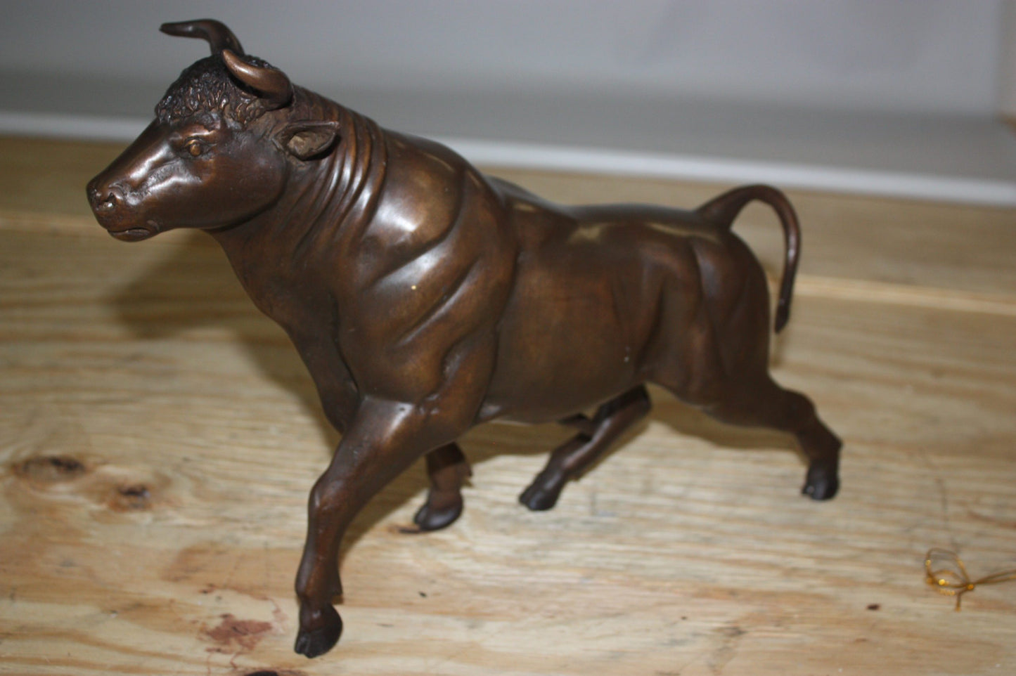 Bull Head up - Bronze Statue - Size: 15"L x 4"W x 10"H.