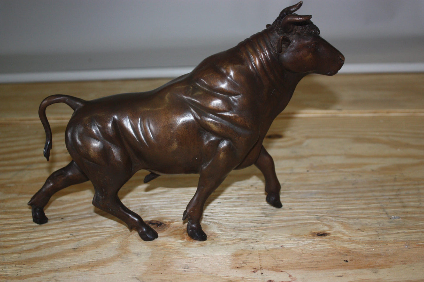 Bull Head up - Bronze Statue - Size: 15"L x 4"W x 10"H.