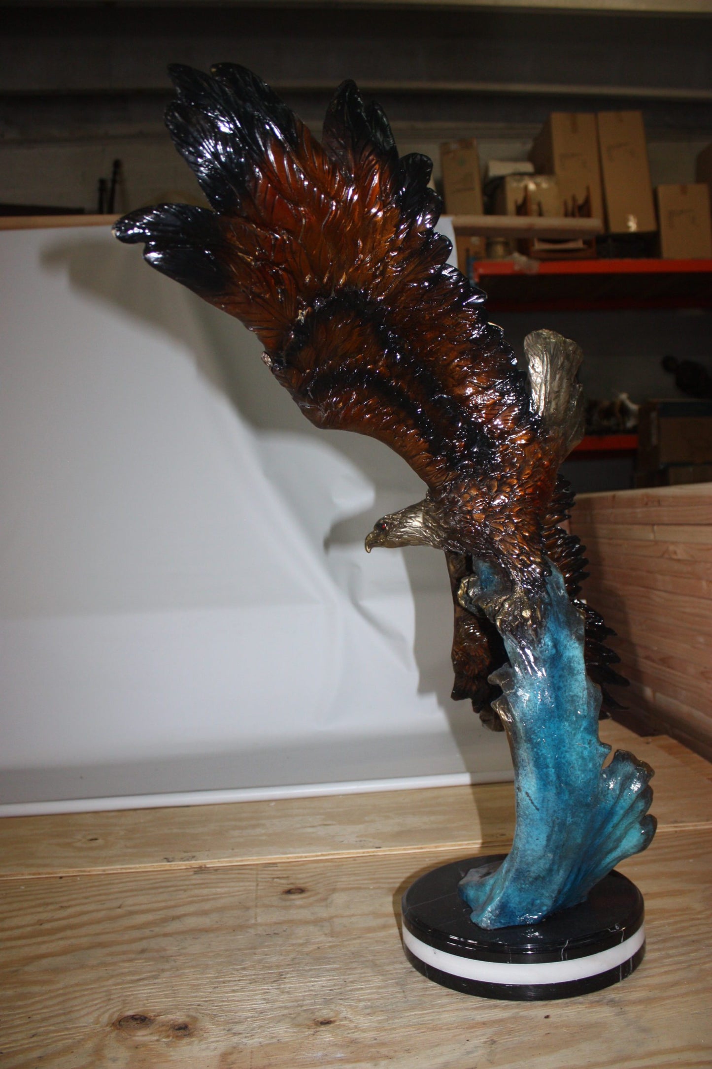 Eagle on a wave - Bronze Statue - Size: 32"L x 12"W x 34"H.