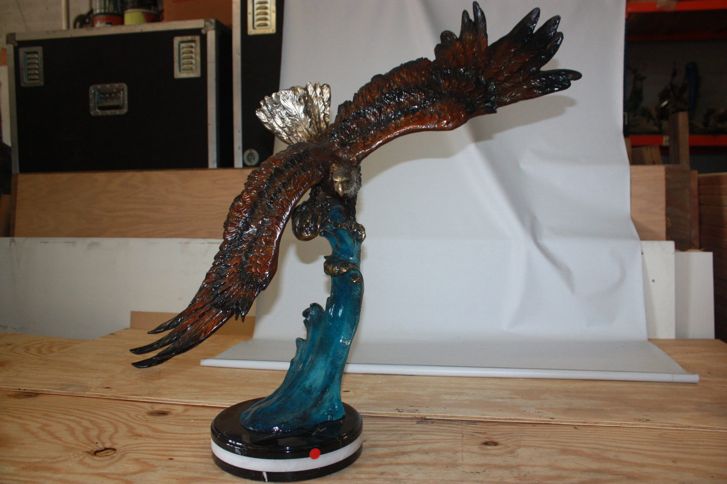 Eagle on a wave - Bronze Statue - Size: 32"L x 12"W x 34"H.