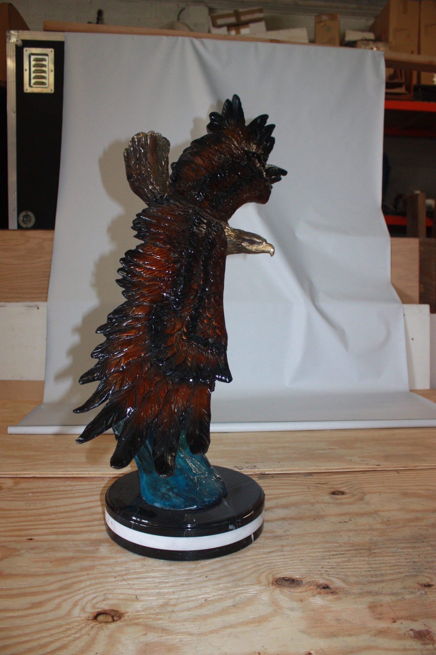 Eagle on a wave - Bronze Statue - Size: 32"L x 12"W x 34"H.