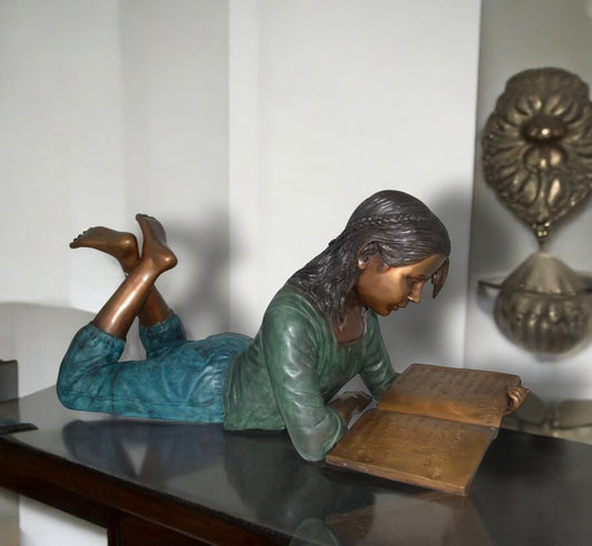 Kate Reading a Book Bronze Statue -  Size: 42"L x 18"W x 17"H.