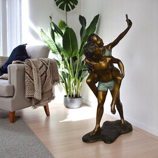 Kids Taking a Selfie W a Smartphone Bronze Statue -  Size: 23"L x 20"W x 43"H.