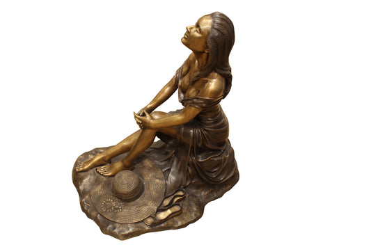 Lady on Stone Bronze Statue -  Size: 33"L x 23"W x 34"H.