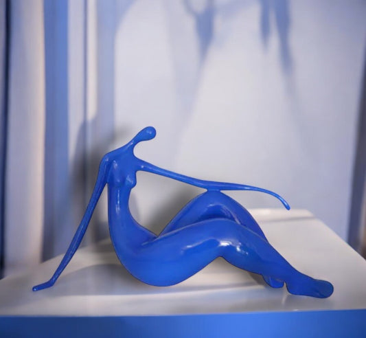 Modern Art Blue Women on the Beach Resin Statue - Size: 27"L x 8"W x 15"H.