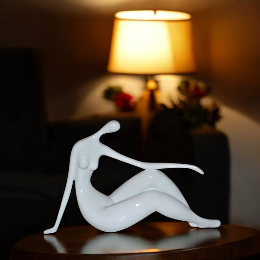 Modern Art Women on the Beach White Resin Statue - Size: 28"L x 8"W x 16"H.