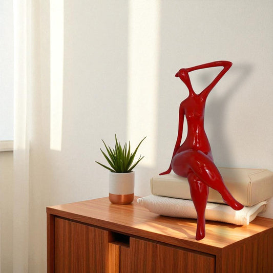 Modern Art Sitting on Edge Girl Made of Resin - Size: 9"L x 7"W x 16"H.