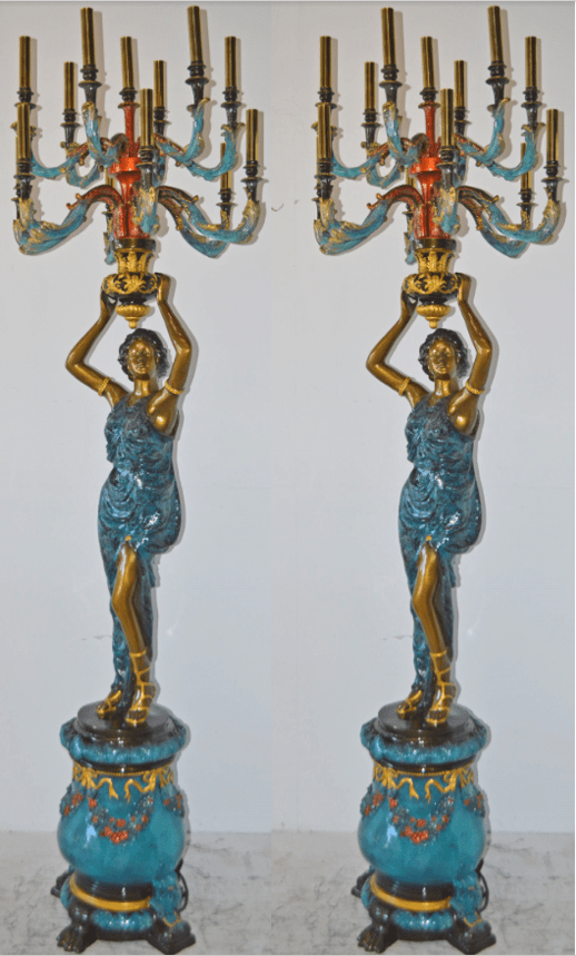 A Pair of Ladies holding a Lamp Bronze Statue - Size: 30"L x 30"W x 100"H.