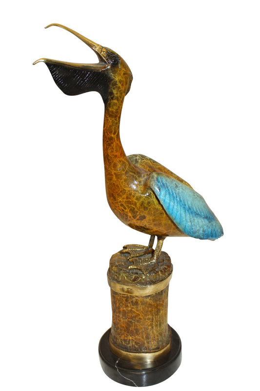 Pelican on a Tree Stump Bronze Statue - Size: 8"L x 12"W x 27"H.