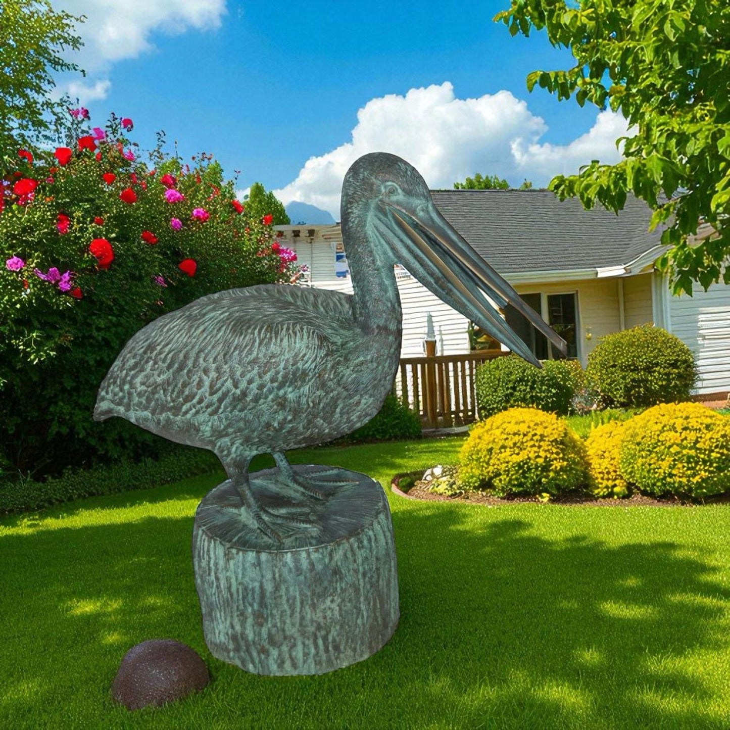 Pelican on a Tree Stump fountain bronze statue - Size: 30"L x 16"W x 30"H.